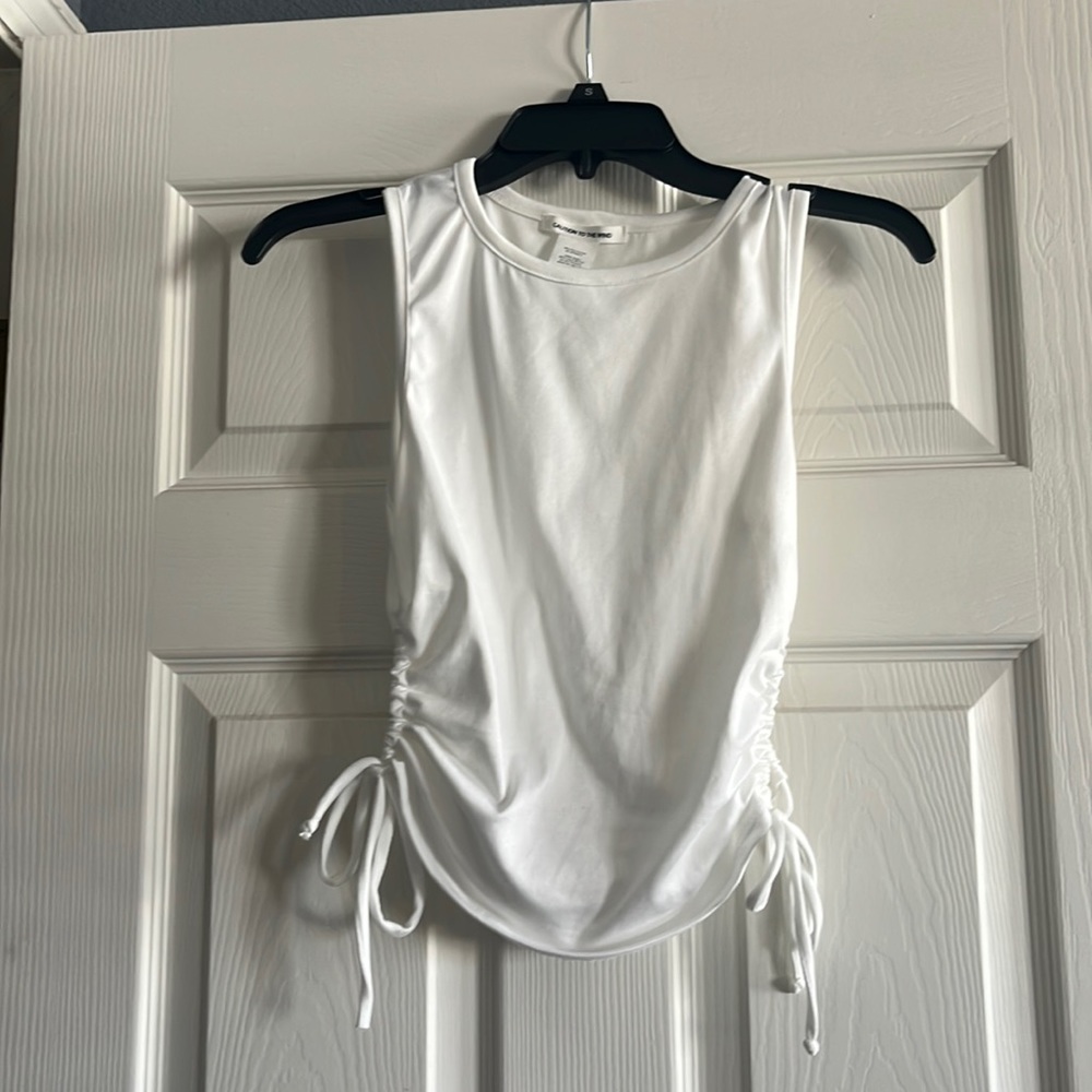 Small caution to the wind tank top